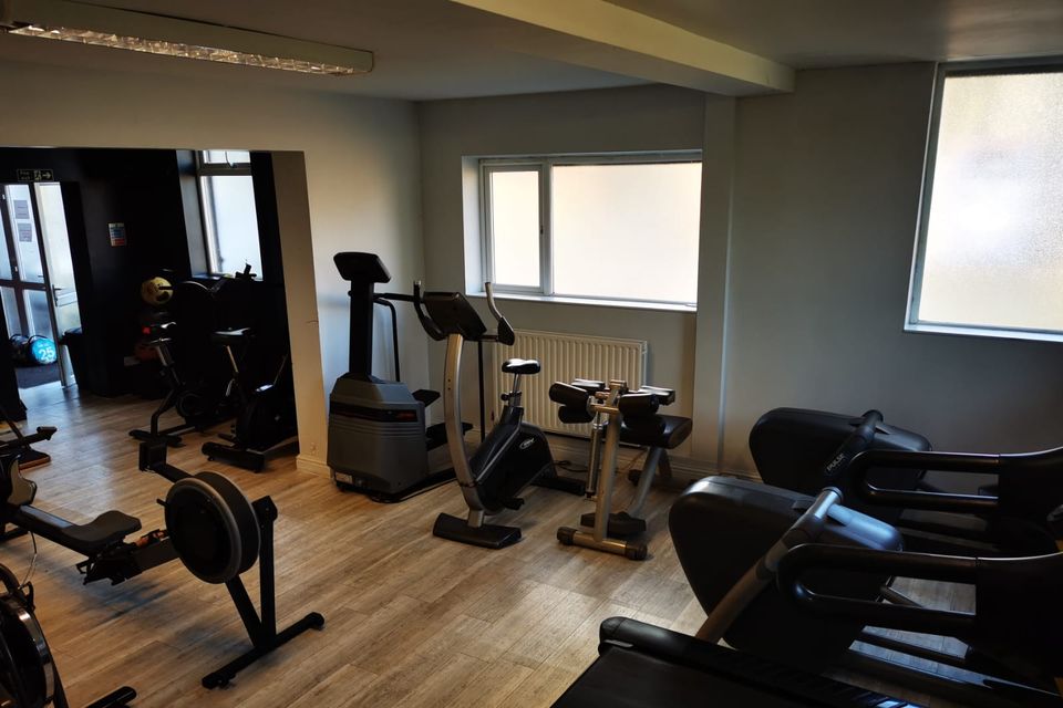 More of the cardio suite: rowing machines, exercise bikes, a stepper and a treadmill.
